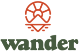 'Wander' logo with sun rising over mountain icon